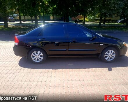 Чорний Кіа Черато, об'ємом двигуна 1.6 л та пробігом 179 тис. км за 5100 $, фото 3 на Automoto.ua