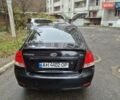 Черный Киа Черато, объемом двигателя 1.98 л и пробегом 180 тыс. км за 4500 $, фото 22 на Automoto.ua