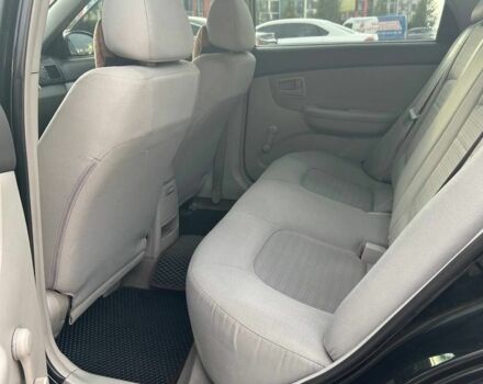 Черный Киа Черато, объемом двигателя 1.6 л и пробегом 292 тыс. км за 4000 $, фото 5 на Automoto.ua