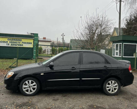 Черный Киа Черато, объемом двигателя 1.59 л и пробегом 273 тыс. км за 2999 $, фото 1 на Automoto.ua