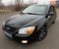 Чорний Кіа Черато, об'ємом двигуна 1.6 л та пробігом 224 тис. км за 4900 $, фото 11 на Automoto.ua