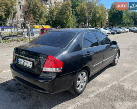Черный Киа Черато, объемом двигателя 1.59 л и пробегом 210 тыс. км за 4100 $, фото 3 на Automoto.ua