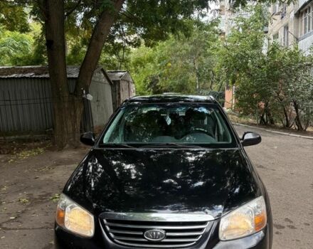 Черный Киа Черато, объемом двигателя 2 л и пробегом 250 тыс. км за 5000 $, фото 1 на Automoto.ua