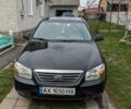 Чорний Кіа Черато, об'ємом двигуна 1.6 л та пробігом 345 тис. км за 4100 $, фото 1 на Automoto.ua
