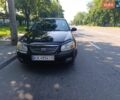 Чорний Кіа Черато, об'ємом двигуна 1.6 л та пробігом 270 тис. км за 3700 $, фото 1 на Automoto.ua