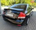 Черный Киа Черато, объемом двигателя 1.59 л и пробегом 219 тыс. км за 4600 $, фото 12 на Automoto.ua