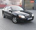 Черный Киа Черато, объемом двигателя 1.6 л и пробегом 200 тыс. км за 4350 $, фото 1 на Automoto.ua