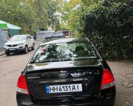 Черный Киа Черато, объемом двигателя 2 л и пробегом 250 тыс. км за 5000 $, фото 3 на Automoto.ua