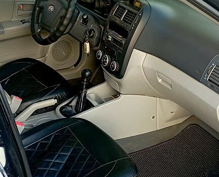 Кіа Черато 2007 у Сумах на Automoto.ua Чорний Кіа Черато, об'ємом двигуна 1.6 л та пробігом 221 тис. км за 4500 $, фото 2 на Automoto.ua