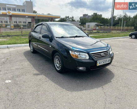 Чорний Кіа Черато, об'ємом двигуна 1.6 л та пробігом 272 тис. км за 5200 $, фото 2 на Automoto.ua