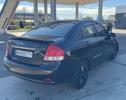 Чорний Кіа Черато, об'ємом двигуна 2 л та пробігом 362 тис. км за 3900 $, фото 4 на Automoto.ua