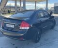 Чорний Кіа Черато, об'ємом двигуна 2 л та пробігом 362 тис. км за 3900 $, фото 4 на Automoto.ua