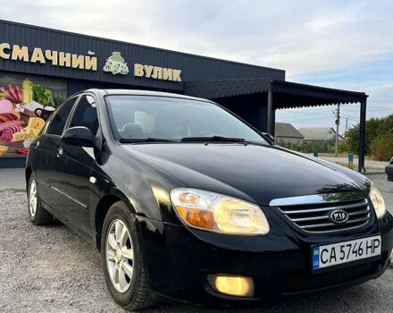 Черный Киа Черато, объемом двигателя 2 л и пробегом 186 тыс. км за 5300 $, фото 4 на Automoto.ua