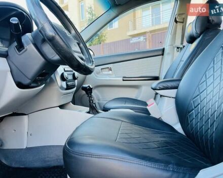 Черный Киа Черато, объемом двигателя 1.6 л и пробегом 210 тыс. км за 3750 $, фото 27 на Automoto.ua