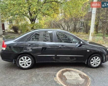 Черный Киа Черато, объемом двигателя 1.98 л и пробегом 180 тыс. км за 4500 $, фото 4 на Automoto.ua