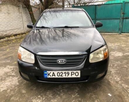 Черный Киа Черато, объемом двигателя 1.6 л и пробегом 240 тыс. км за 3300 $, фото 1 на Automoto.ua