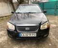 Черный Киа Черато, объемом двигателя 1.6 л и пробегом 240 тыс. км за 3300 $, фото 1 на Automoto.ua
