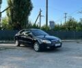 Чорний Кіа Черато, об'ємом двигуна 1.6 л та пробігом 251 тис. км за 3800 $, фото 1 на Automoto.ua