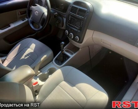 Черный Киа Черато, объемом двигателя 1.6 л и пробегом 220 тыс. км за 3800 $, фото 11 на Automoto.ua