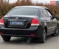 Чорний Кіа Черато, об'ємом двигуна 1.6 л та пробігом 224 тис. км за 4900 $, фото 17 на Automoto.ua