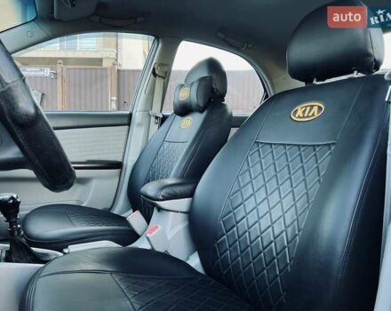 Черный Киа Черато, объемом двигателя 1.6 л и пробегом 210 тыс. км за 3750 $, фото 28 на Automoto.ua