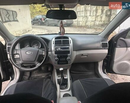 Черный Киа Черато, объемом двигателя 1.6 л и пробегом 230 тыс. км за 4950 $, фото 9 на Automoto.ua