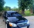 Чорний Кіа Черато, об'ємом двигуна 1.6 л та пробігом 280 тис. км за 4800 $, фото 1 на Automoto.ua