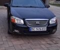 Чорний Кіа Черато, об'ємом двигуна 1.6 л та пробігом 200 тис. км за 4200 $, фото 1 на Automoto.ua