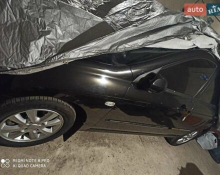 Чорний Кіа Черато, об'ємом двигуна 0 л та пробігом 25 тис. км за 7000 $, фото 5 на Automoto.ua