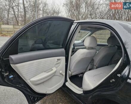 Черный Киа Черато, объемом двигателя 1.6 л и пробегом 280 тыс. км за 4300 $, фото 9 на Automoto.ua