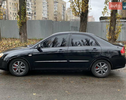 Черный Киа Черато, объемом двигателя 1.98 л и пробегом 306 тыс. км за 3800 $, фото 3 на Automoto.ua