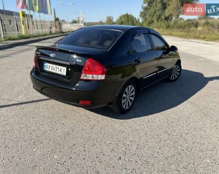 Чорний Кіа Черато, об'ємом двигуна 1.98 л та пробігом 163 тис. км за 5500 $, фото 2 на Automoto.ua