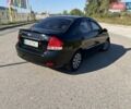Чорний Кіа Черато, об'ємом двигуна 1.98 л та пробігом 163 тис. км за 5500 $, фото 2 на Automoto.ua