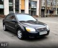 Черный Киа Черато, объемом двигателя 1.6 л и пробегом 204 тыс. км за 3700 $, фото 1 на Automoto.ua