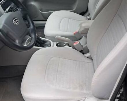 Черный Киа Черато, объемом двигателя 1.59 л и пробегом 349 тыс. км за 4000 $, фото 7 на Automoto.ua