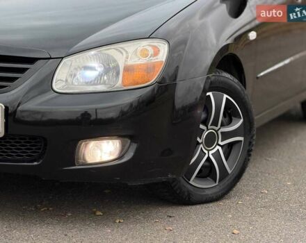 Чорний Кіа Черато, об'ємом двигуна 1.6 л та пробігом 224 тис. км за 4900 $, фото 4 на Automoto.ua