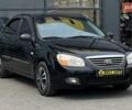 Чорний Кіа Черато, об'ємом двигуна 1.6 л та пробігом 190 тис. км за 4600 $, фото 1 на Automoto.ua