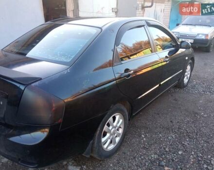 Черный Киа Черато, объемом двигателя 1.6 л и пробегом 228 тыс. км за 4300 $, фото 4 на Automoto.ua