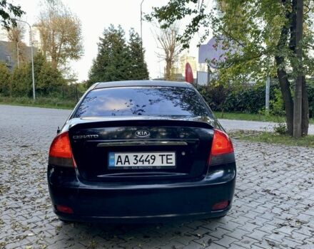 Черный Киа Черато, объемом двигателя 2 л и пробегом 302 тыс. км за 4600 $, фото 2 на Automoto.ua