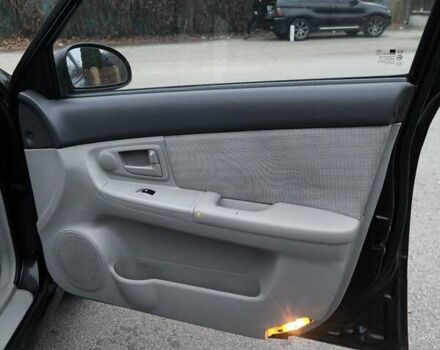 Чорний Кіа Черато, об'ємом двигуна 1.59 л та пробігом 300 тис. км за 4550 $, фото 25 на Automoto.ua