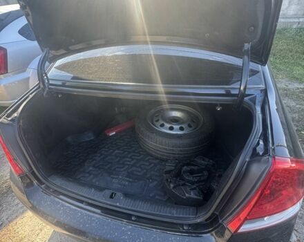 Черный Киа Черато, объемом двигателя 1.6 л и пробегом 126 тыс. км за 5200 $, фото 7 на Automoto.ua