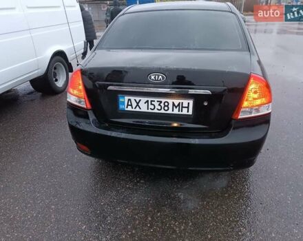 Черный Киа Черато, объемом двигателя 1.6 л и пробегом 260 тыс. км за 5200 $, фото 2 на Automoto.ua