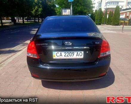 Чорний Кіа Черато, об'ємом двигуна 1.6 л та пробігом 179 тис. км за 5100 $, фото 2 на Automoto.ua