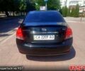 Чорний Кіа Черато, об'ємом двигуна 1.6 л та пробігом 179 тис. км за 5100 $, фото 2 на Automoto.ua