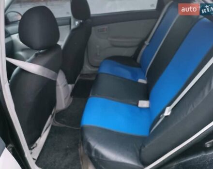 Черный Киа Черато, объемом двигателя 1.6 л и пробегом 260 тыс. км за 5200 $, фото 3 на Automoto.ua