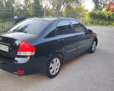 Чорний Кіа Черато, об'ємом двигуна 1.6 л та пробігом 204 тис. км за 4900 $, фото 9 на Automoto.ua