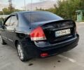 Чорний Кіа Черато, об'ємом двигуна 1.6 л та пробігом 264 тис. км за 4370 $, фото 3 на Automoto.ua