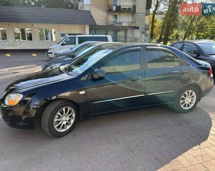 Чорний Кіа Черато, об'ємом двигуна 1.6 л та пробігом 106 тис. км за 5300 $, фото 24 на Automoto.ua