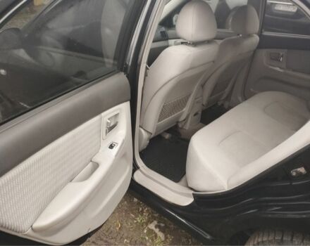 Черный Киа Черато, объемом двигателя 2 л и пробегом 380 тыс. км за 3600 $, фото 4 на Automoto.ua