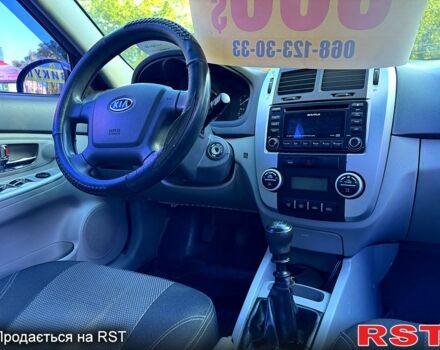 Черный Киа Черато, объемом двигателя 1.6 л и пробегом 174 тыс. км за 4550 $, фото 6 на Automoto.ua